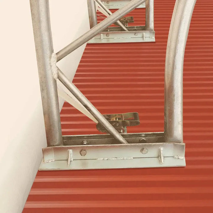 TMG-DT6070CF 60' x 70' dual truss container shelter with heavy duty 28oz PVC cover, enclosed end wall and front drop
