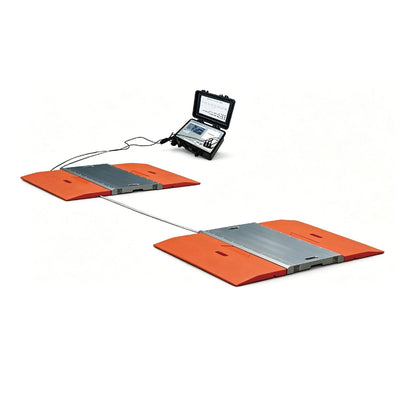 Two orange and silver axle pads linked to portable digital display, axle pad scale