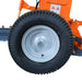 Close-up view of transport wheel and tire on ATV/UTV Tow Behind Flail Mower.