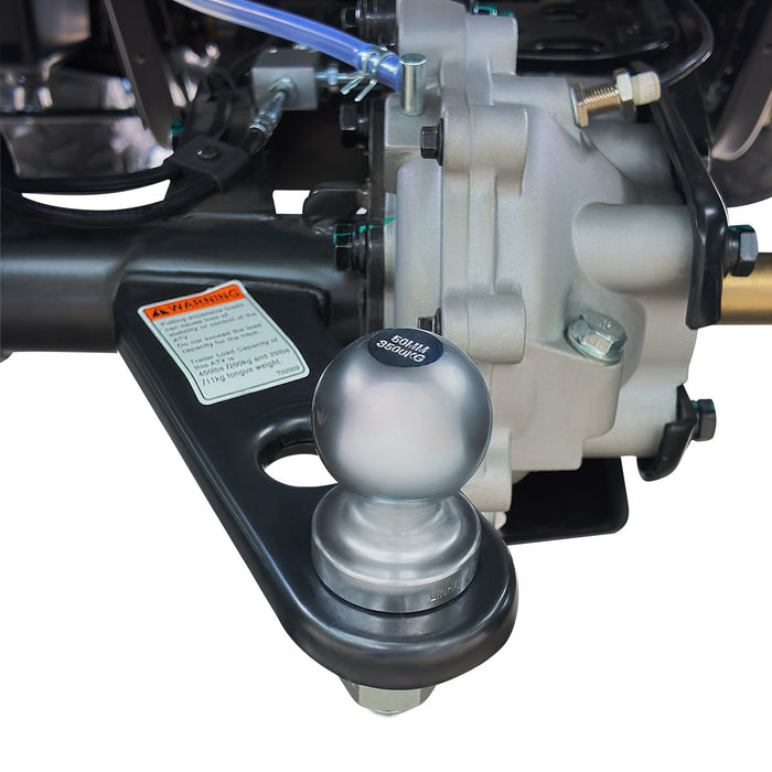Close-up of trailer hitch ball and mounting bracket on ATV