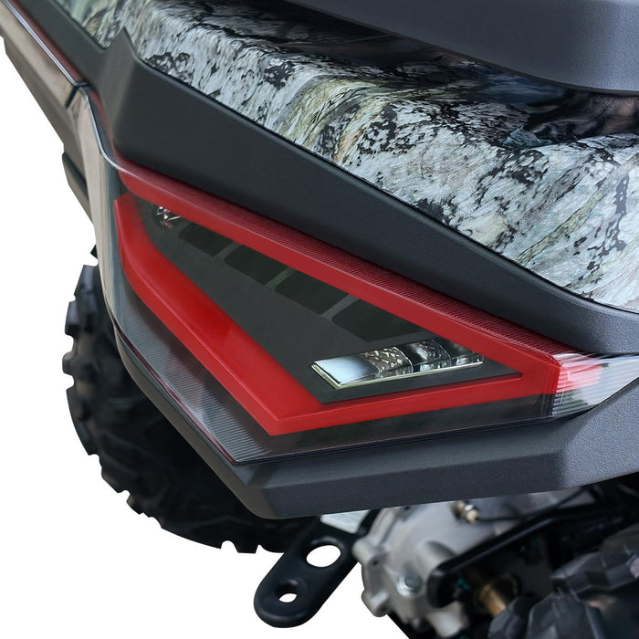 Rear taillight lens with red trim and camouflage panel on ATV