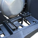 Rear footpeg and exhaust area detail on TMG ATV.