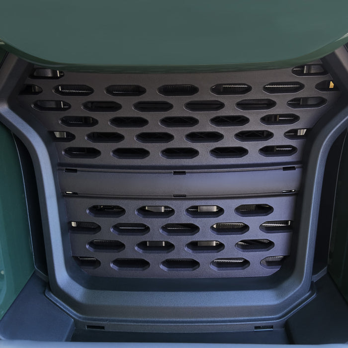 Close-up black vented front grille and bumper area on ATV.