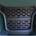 Close-up black vented front grille and bumper area on ATV.