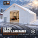 Snow Series 40' x 40' Dual Truss Storage Shelter shown in snowy scene with tractor inside