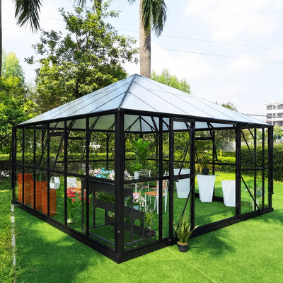 Black aluminum framed Gazebo Sunroom Greenhouse on lawn with potted plants.