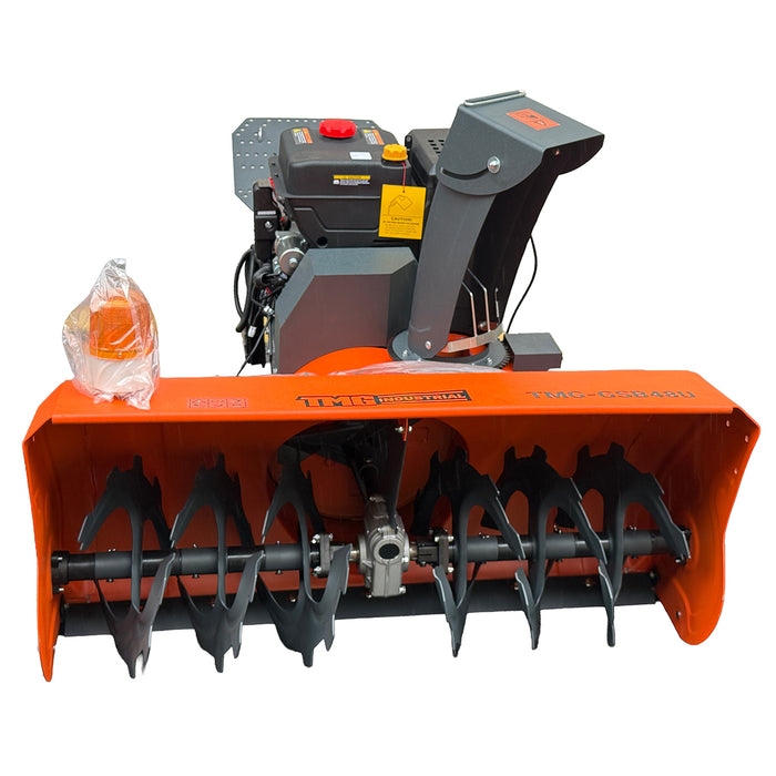 Front view of the TMG-GSB48U snow blower showing the serrated auger, central gearbox, orange intake housing and discharge chute.