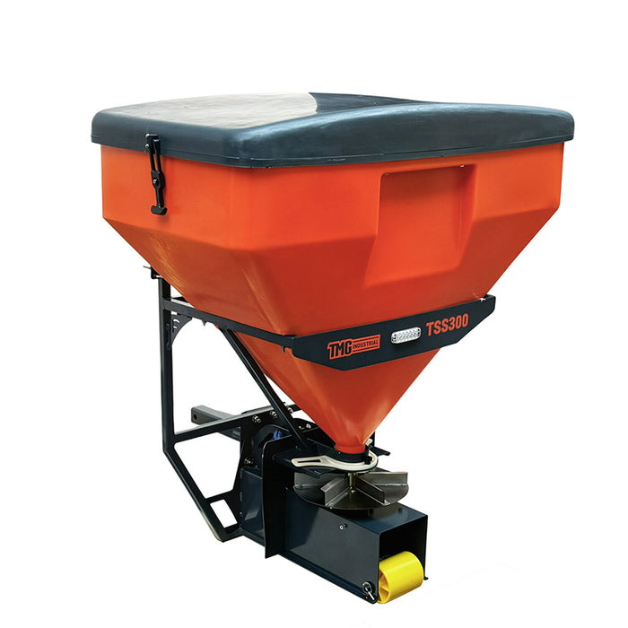 Opposite front angled view of the TMG-TSS300 salt spreader showing the covered orange hopper, model label and spinner disc above the lower guard.